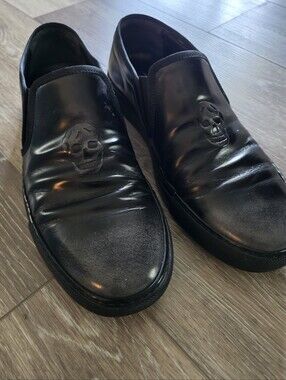 Alexander McQueen Men's Distressd Black Leather Loafers with Embossed Skull